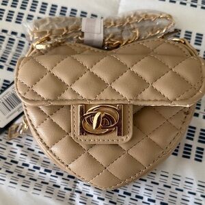 Bebe Quilted Heart Crossbody Bag in Beige